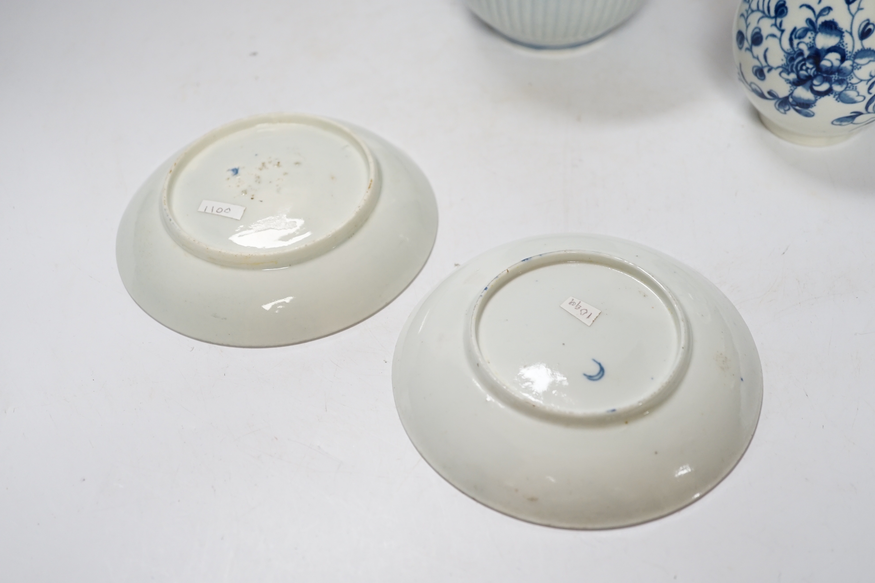 A Worcester Mansfield pattern sparrow beak milk jug, two saucers and a Worcester sucrier and cover, late 18th century